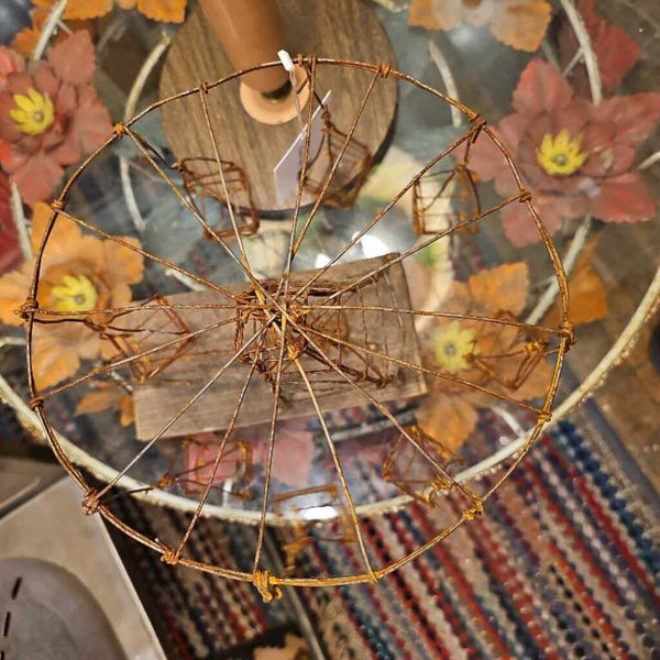 Folk art wire carnival swing