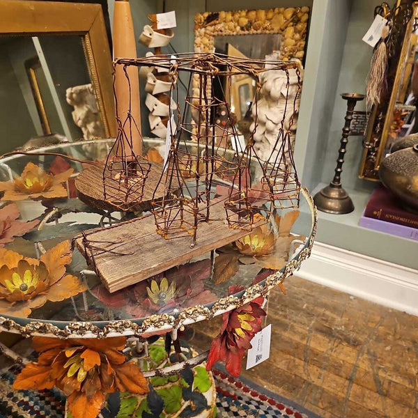 Folk art wire carnival swing
