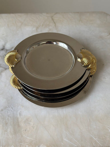 1149 Four silverplate shell coasters
