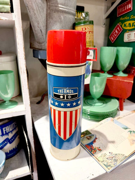 JFV ~ Vintage patriotic thermos sold as is.