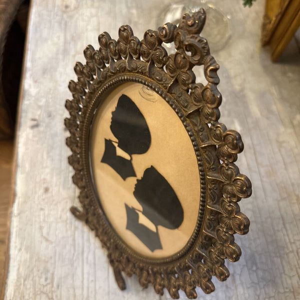 SILHOUETTES IN CLOVER FRAME, AS FOUND