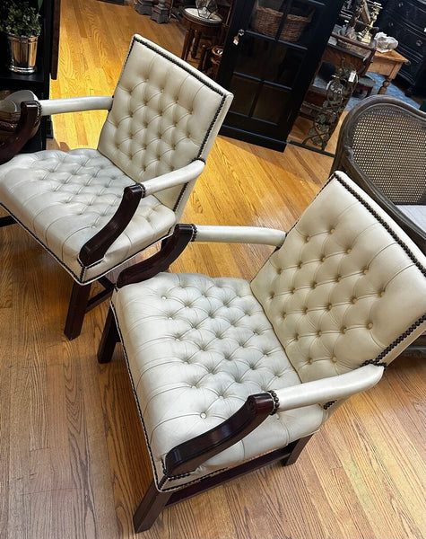 PAIR OF JASPER SEATING ANILINE-DYED WHITE LEATHER AND WOOD TUFTED ARMCHAIRS WITH BRASS NAILHEAD TRIM, AS FOUND. 35"H x 27"D x 24"W. IN STORE PICKUP.