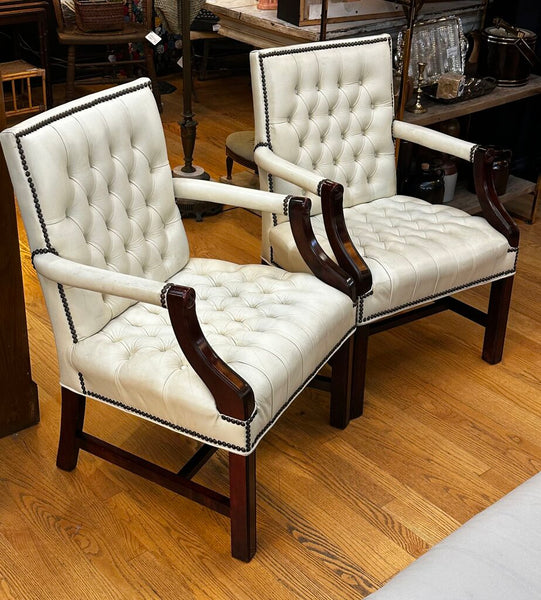 PAIR OF JASPER SEATING ANILINE-DYED WHITE LEATHER AND WOOD TUFTED ARMCHAIRS WITH BRASS NAILHEAD TRIM, AS FOUND. 35"H x 27"D x 24"W. IN STORE PICKUP.