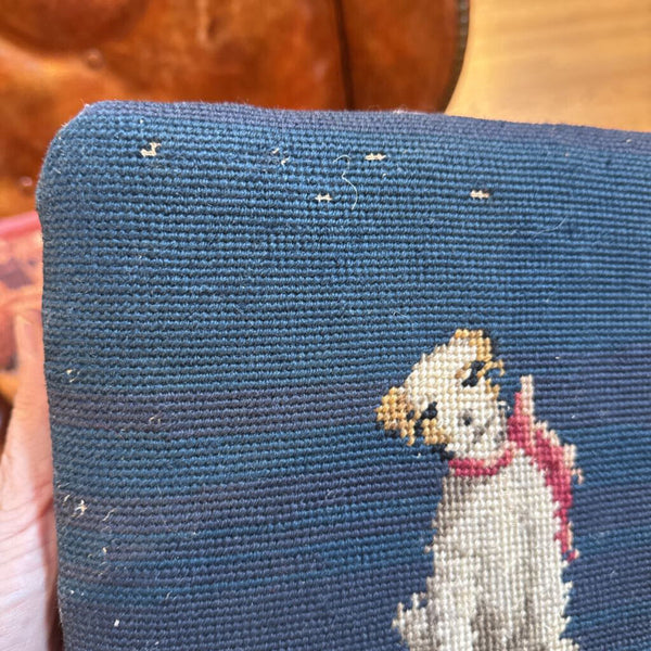 Old needlepoint footstool of a dog some wear on top of 9.5” square x 8” h