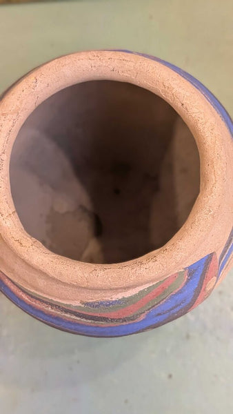 Tan with blue and pink Ozark roadside pottery approximately 7 inches