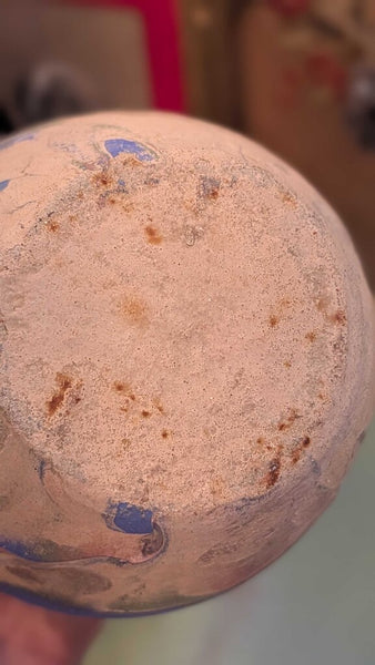 Tan with blue and pink Ozark roadside pottery approximately 7 inches