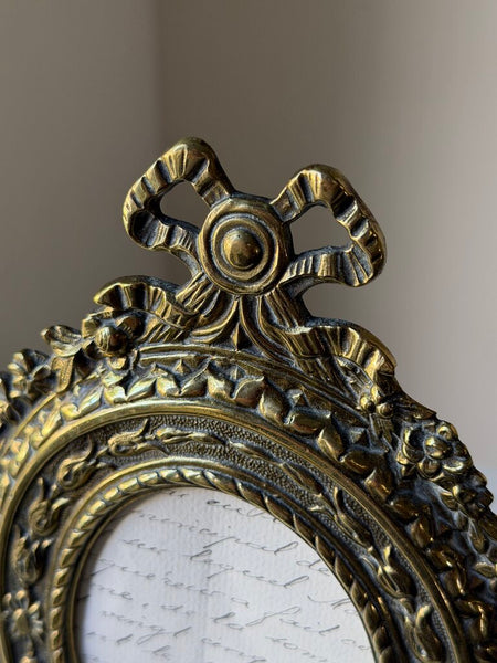 1597 Antique Oval Brass Bow Frame