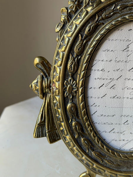 1597 Antique Oval Brass Bow Frame