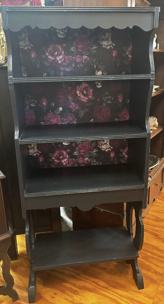 Black Bookcase with skull and roses wallpaper