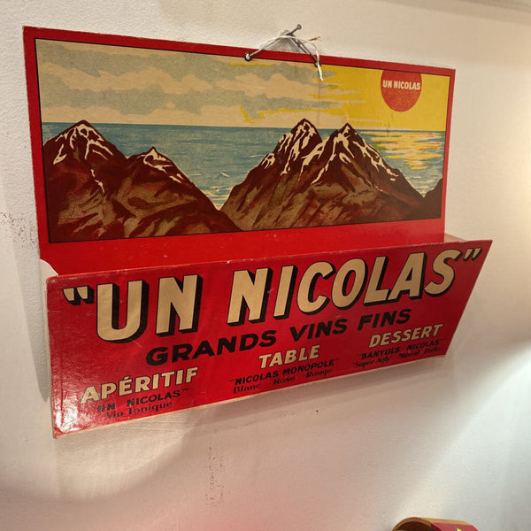 Un Nicolas wine menu holder from France