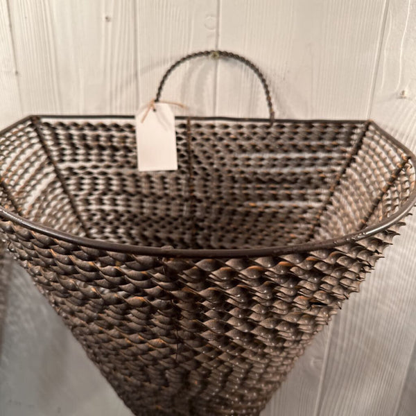 Heavy metal cone shaped wall basket