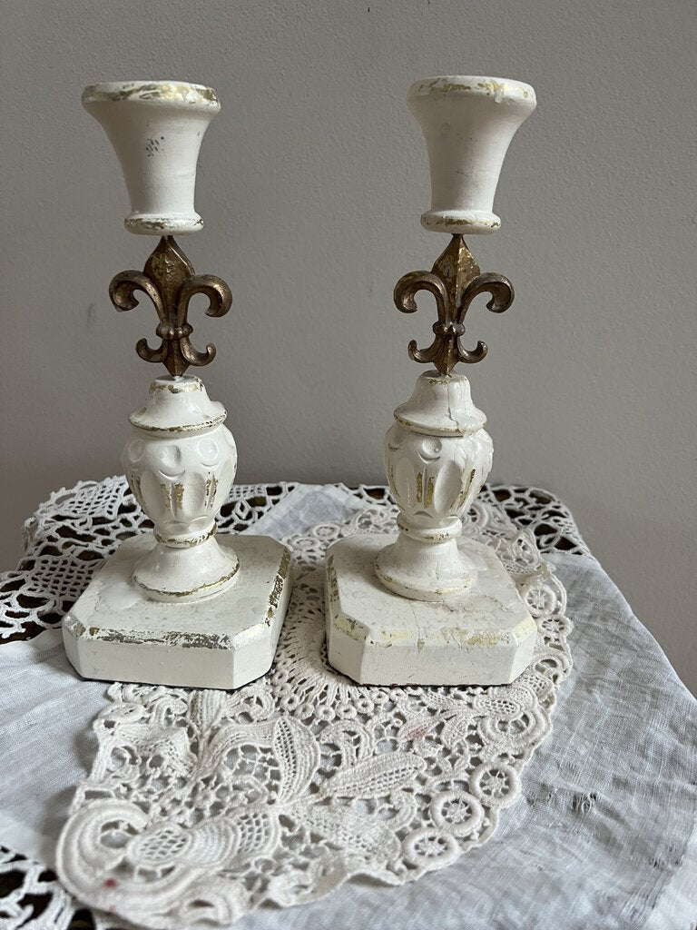 Pair of candlesticks from Marshall Field's with Fleur de Lis motif, 9 1/2" tall