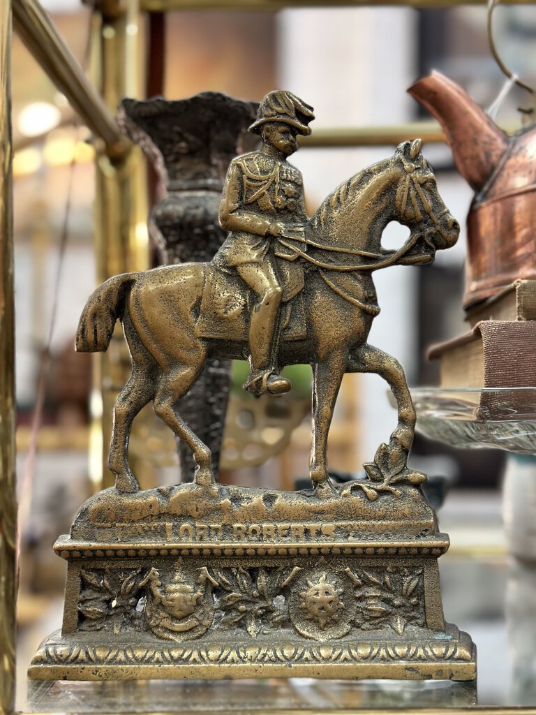 Antique cast brass lord roberts door stop