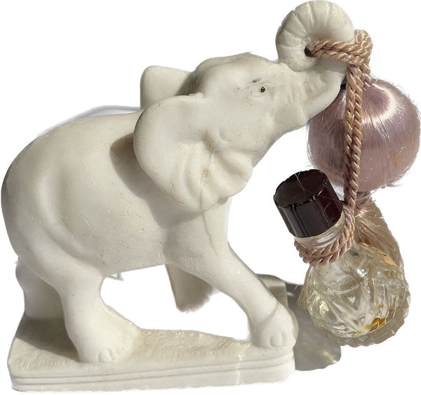 rare elephant perfume bottle. holder with original gardenia label