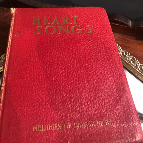 HEART SONGS red leather book as found